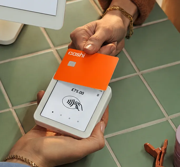 Tapping a Cashi card on a contactless payment terminal